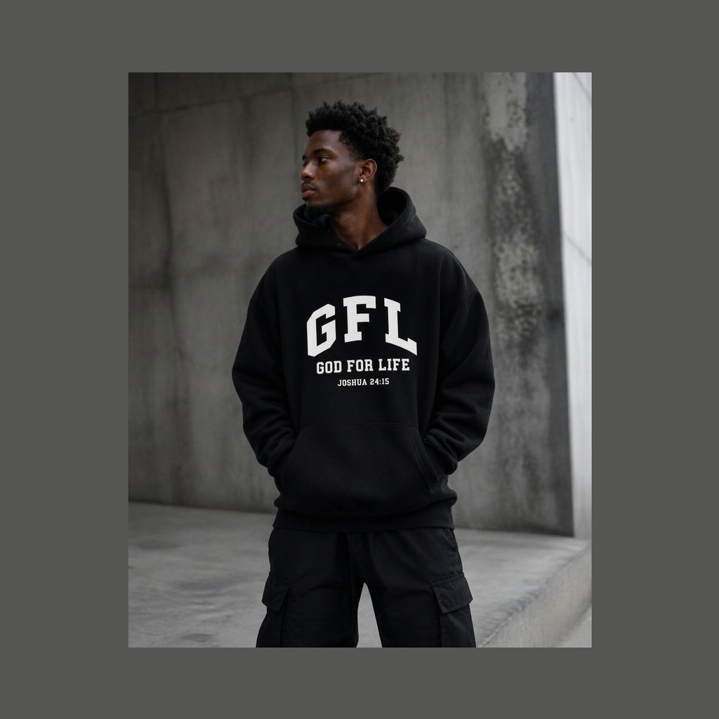 Man in an oversized black God for Life hoodie