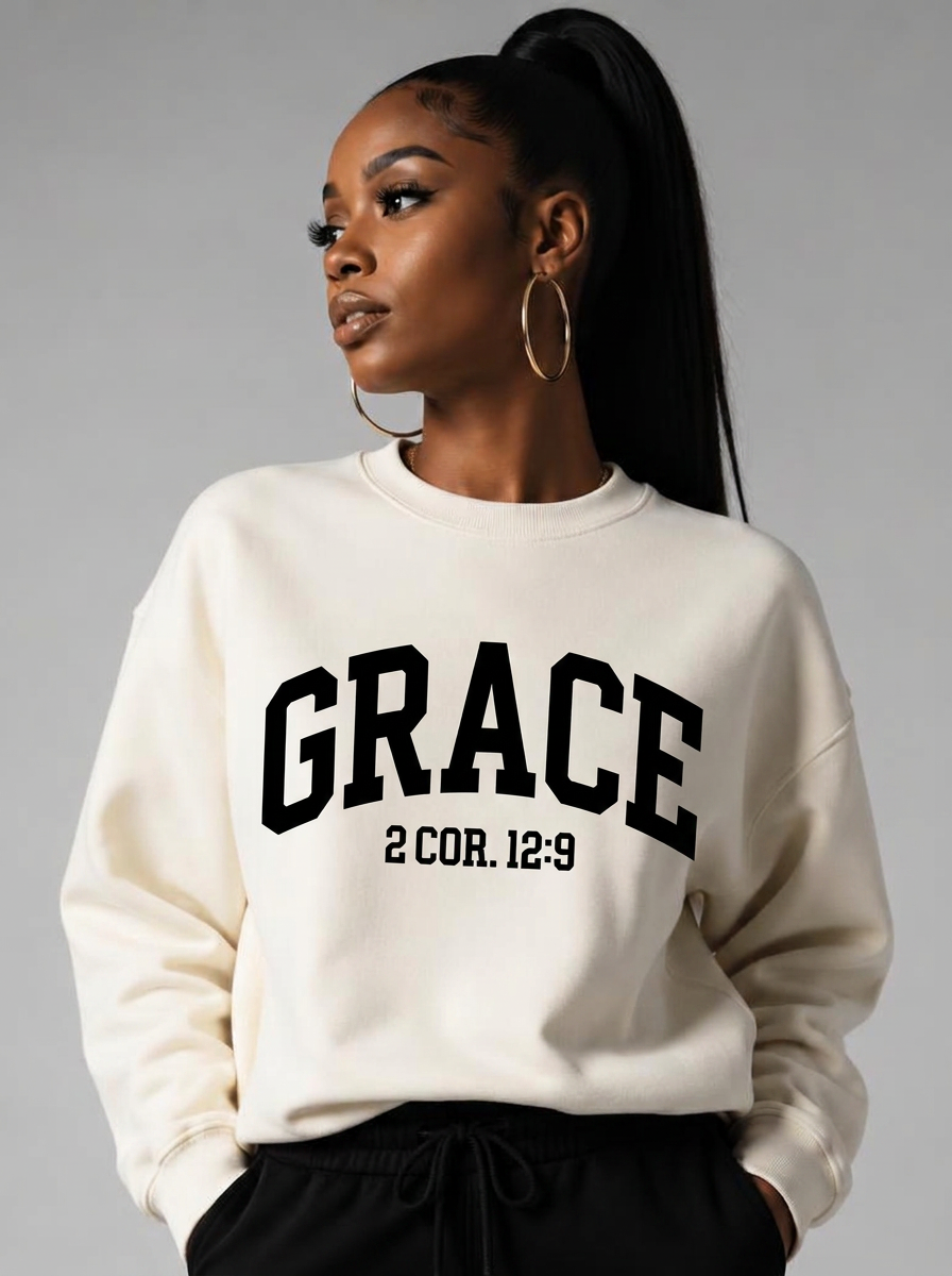 Woman with ponytail in cream Grace 2 Cor. 12:9 crewneck